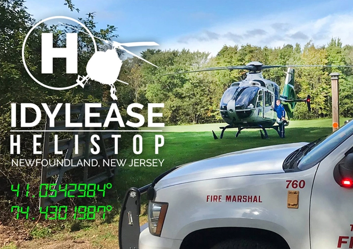 Fire Marshal vehicle and helicopter at Idylease Helistop during ground operations